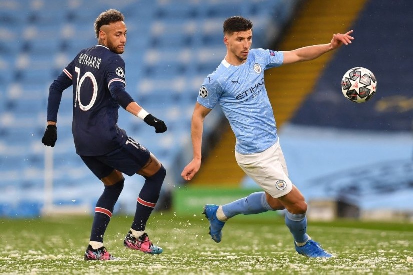 Paris Saint-Germain's Brazilian forward Neymar (L) vies with Manchester City's Portuguese defender Ruben Dias during the UEFA Champions League second leg semi-final football match between Manchester City and Paris Saint-Germain (PSG) at the Etihad Stadium in Manchester, north west England, on May 4, 2021. (Photo by Paul ELLIS / AFP) (Photo by PAUL ELLIS/AFP via Getty Images)