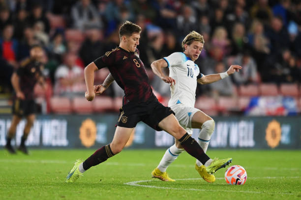 SHEFFIELD, ENGLAND - SEPTEMBER 27: Conor Gallagher of England is challenged by Angelo Stiller of Germany during the International Friendly match between England U21 and Germany U21 at Bramall Lane on September 27, 2022 in Sheffield, England. (Photo by Michael Regan - The FA/The FA via Getty Images)
